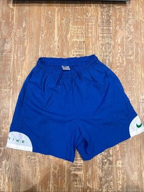 Nike Blue Athletic Shorts with White & Green Accents